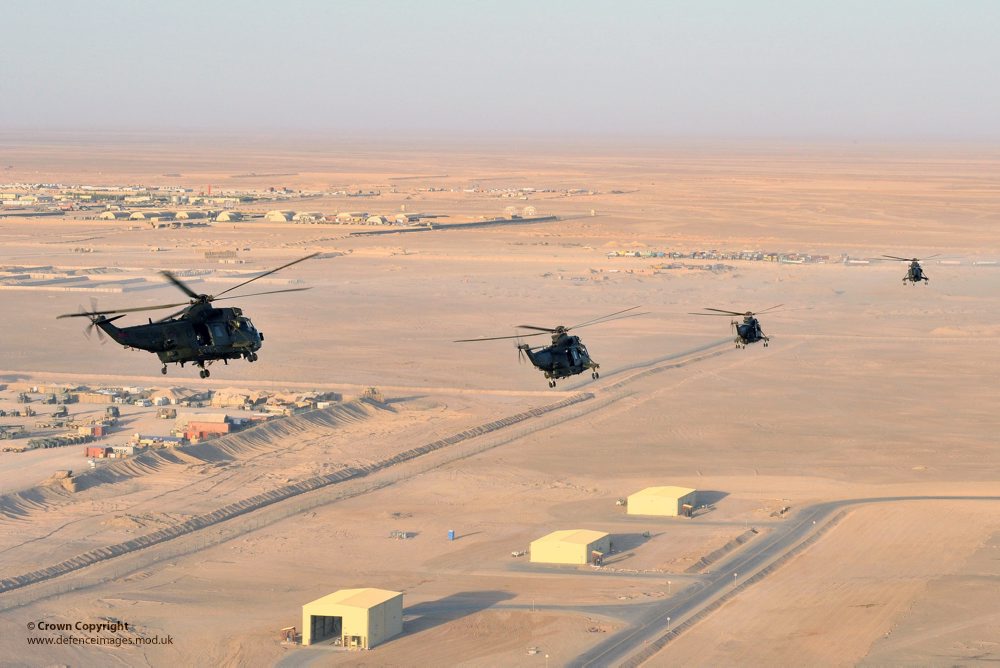 Royal Navy SeaKing Helicopters Fly Over Camp Bastion Afghanistan